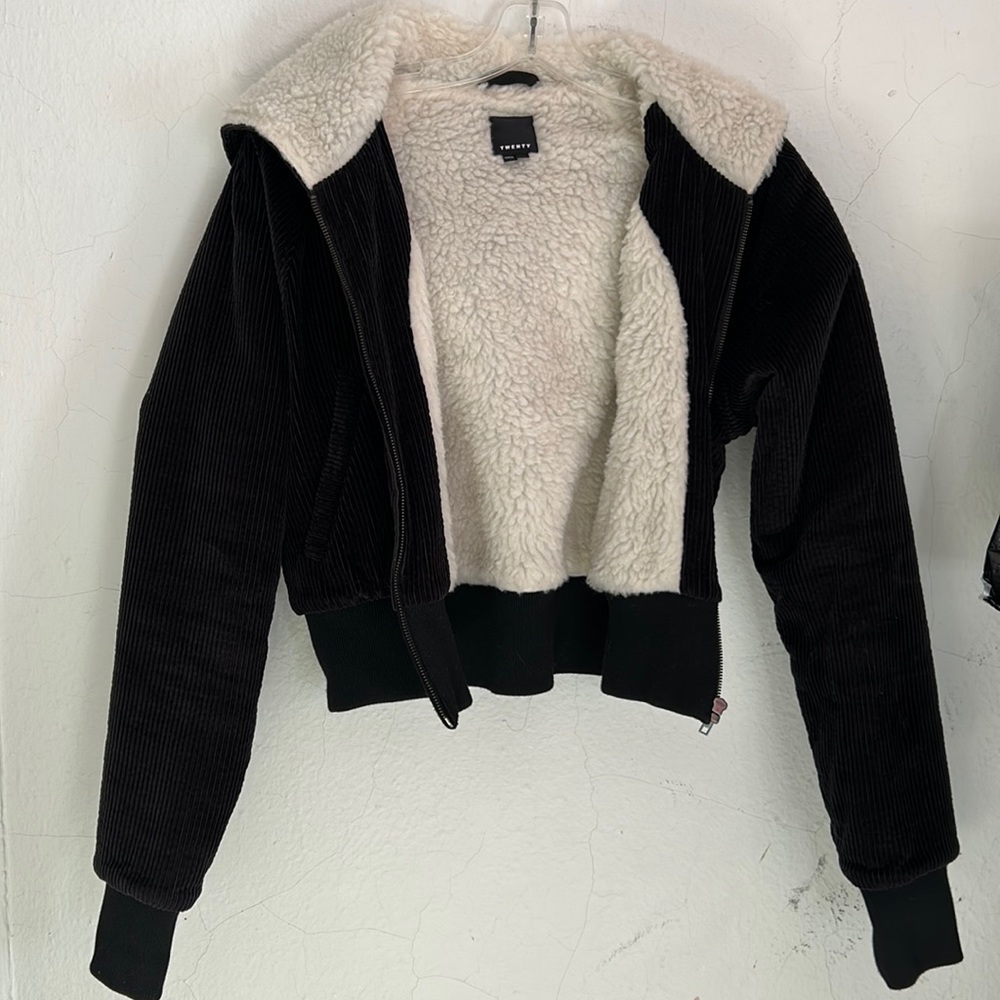 Black waist size Small Jacket/coat